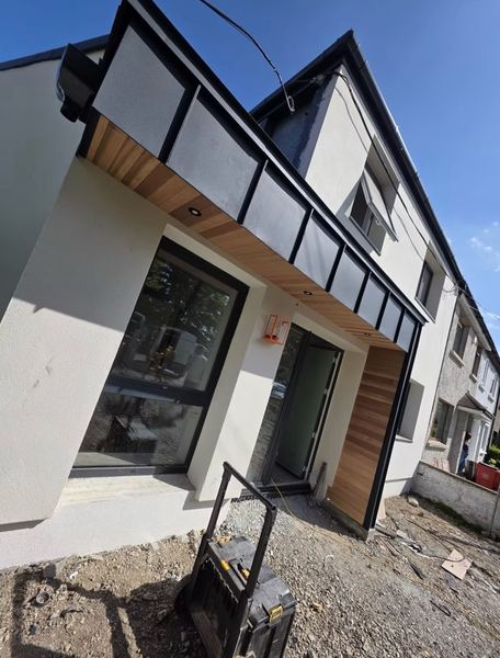 Modern two-storey extension with cedar and zinc cladding in Dublin