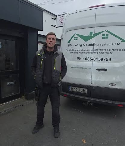 DD Roofing and Cladding Systems team member with company van